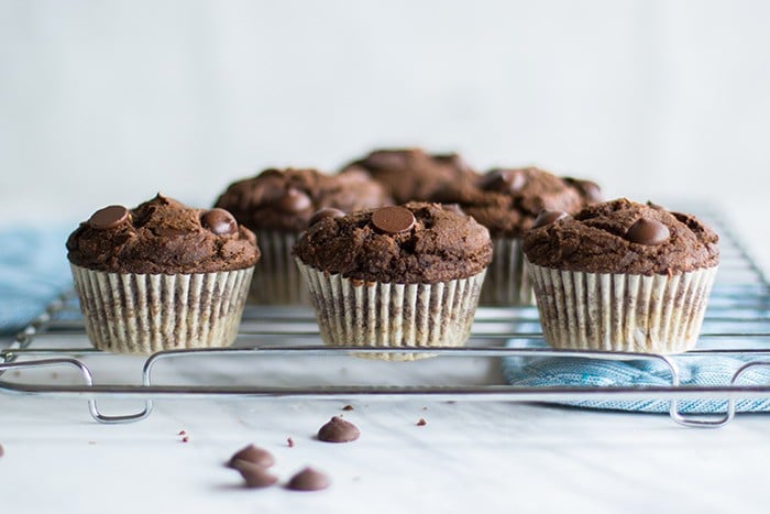 Sugar free cake recipe for chocolate cakes shown cooling on a rack.