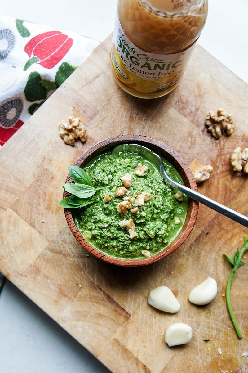 Basil Walnut Pesto - Vitamin Sunshine / This fresh pesto takes 5 minutes to make, and is a super fresh, vibrant topping for salads, sandwiches, meats.. perfect summer condiment!