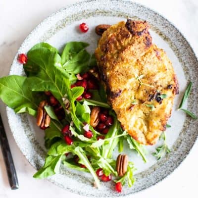 A top view of a piece of crunchy baked almond chicken.