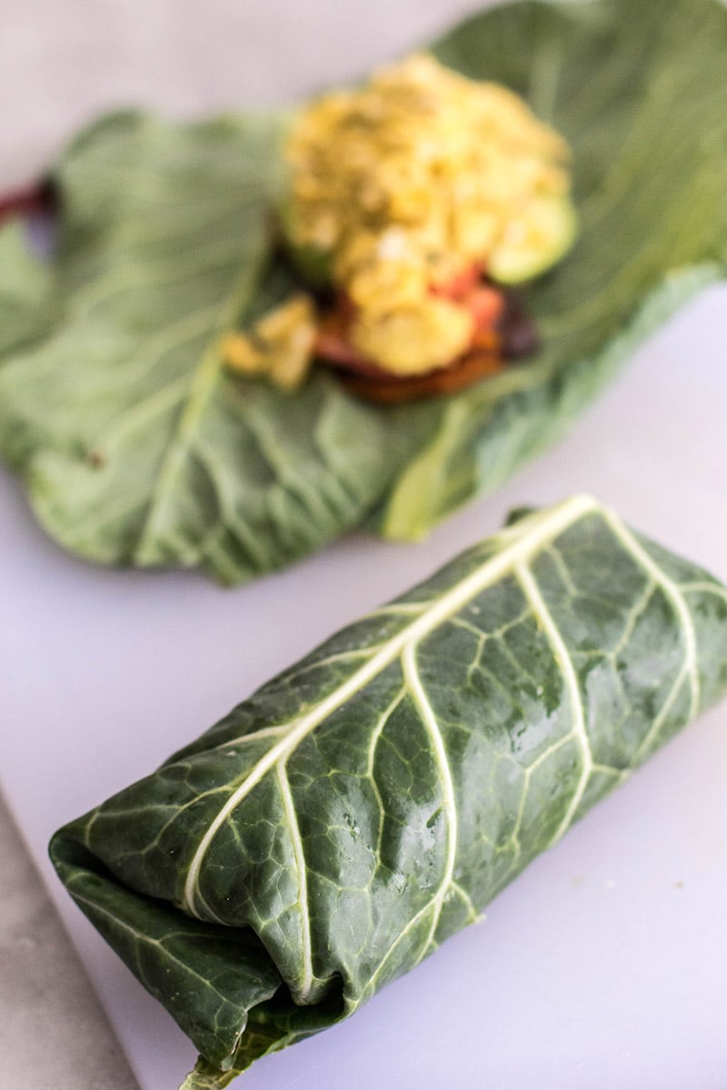 Collard Wrap Breakfast Burritos / These low carb breakfast burritos are packed with black beans, butternut squash, eggs, avocado and veggies.