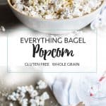 Drizzling everything bagel seasoning over a large bowl of popcorn.