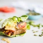 Pumpkin Seed Veggie Burgers / These easy veggie burgers are packed with plant proteins and tons of flavor. Enjoy as a lettuce wrap or on a bun.