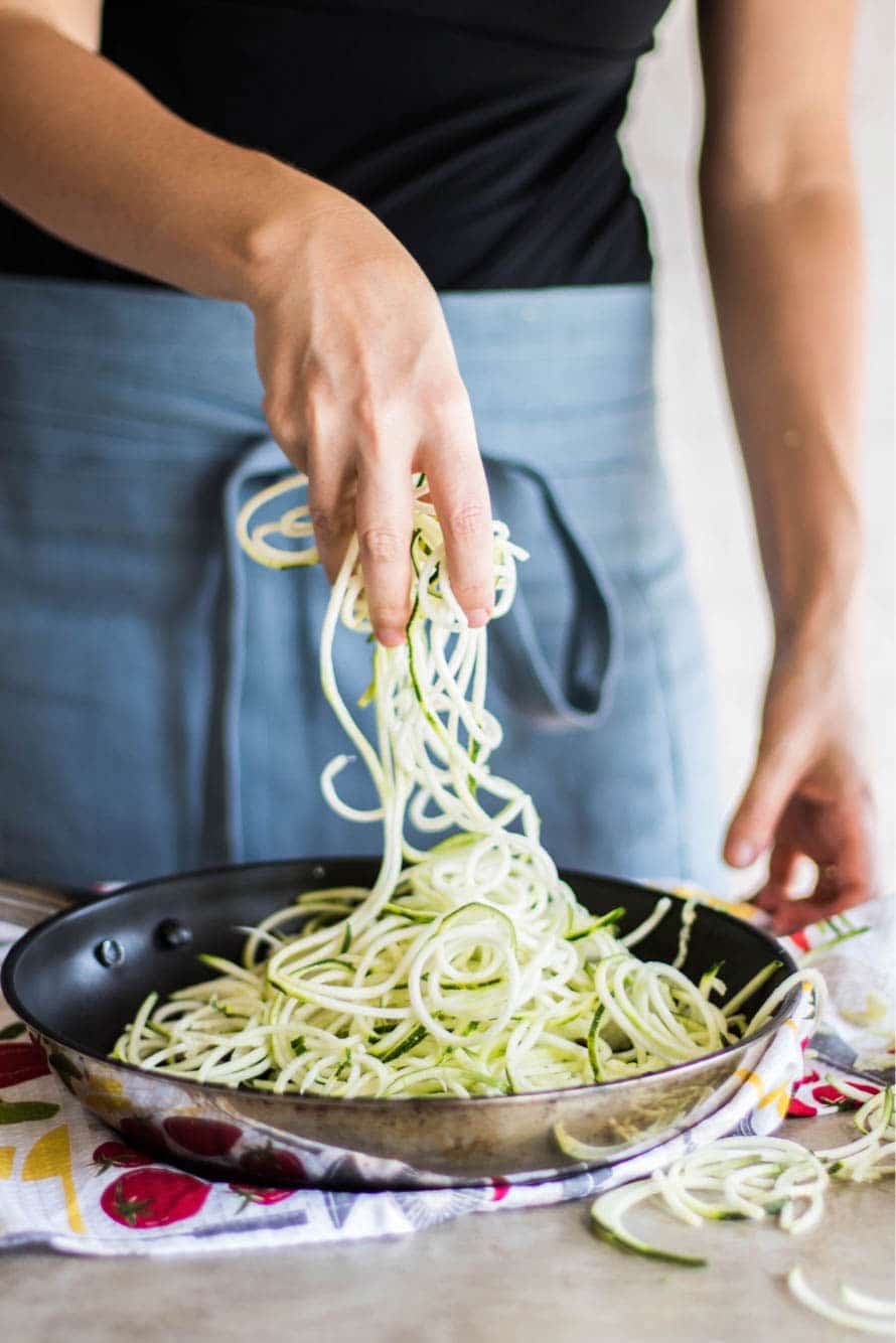 A pan filled with zucchini noodles (zoodles). 