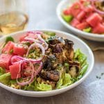 A salad piled high with sticky sweet balsamic chicken and watermelon.