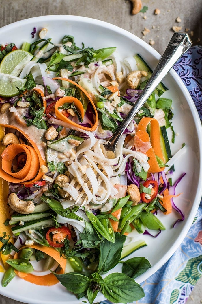 An upclose shot of a cold thai noodle salad.