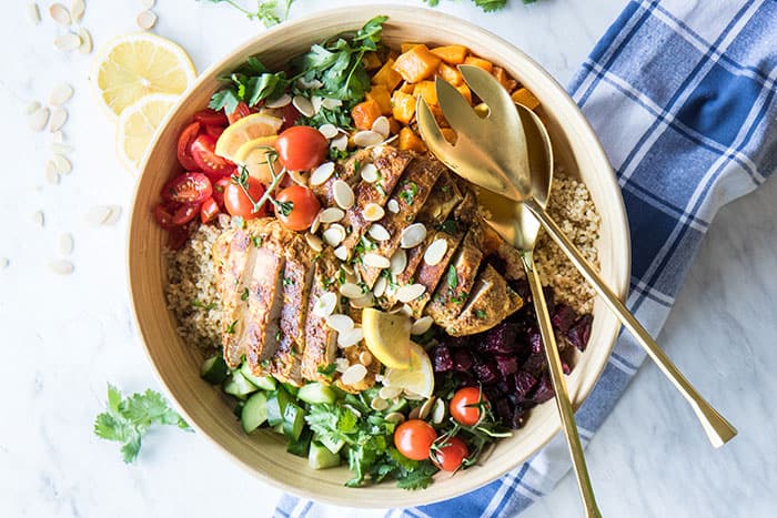 Quinoa Recipe / This nutritious gluten free grain salad is filled with vegetables, herbs, and a mouth watering Moroccan spiced chicken.