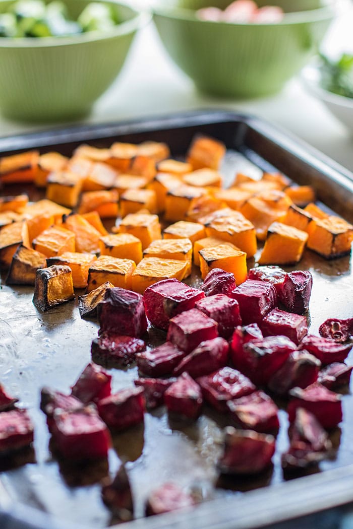 A pan of roasted butternut squash and beets.