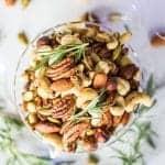Holiday Spiced Mixed Nuts / Toasted nuts are mixed with a flavorful and festive combination of shallots, rosemary, and spices.