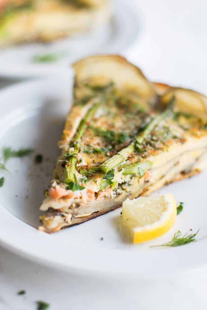 A slice of Whole30 Frittata with a potato crust.