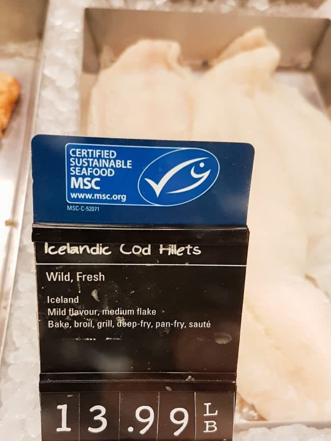 An MSC Blue Fish label indicating the fish at the fish counter is wild caught sustainable seafood.