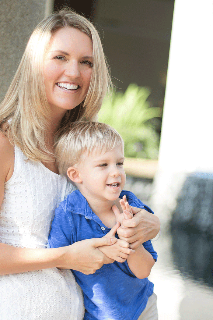 Michelle and her son sitting together.