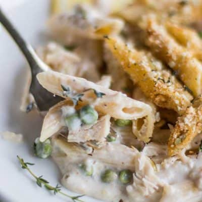 A green pot filled with creamy gluten free tuna casserole.