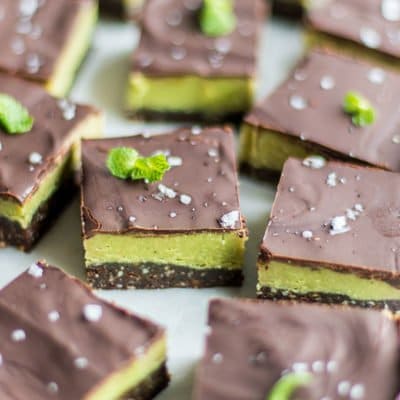 Raw peppermint vegan brownies, shown cut into little squares. A healthy no bake brownie.