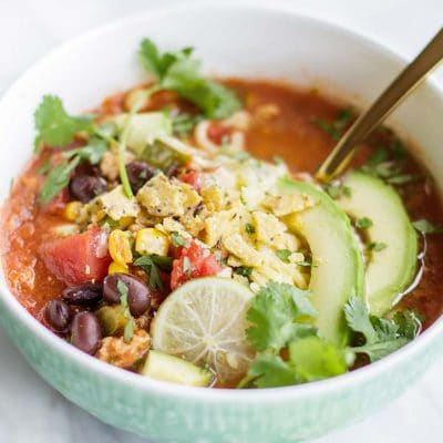 Taco Soup Recipe shown in a blue bowl.