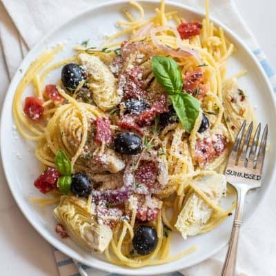 A plate of a mediterranean pasta dish.