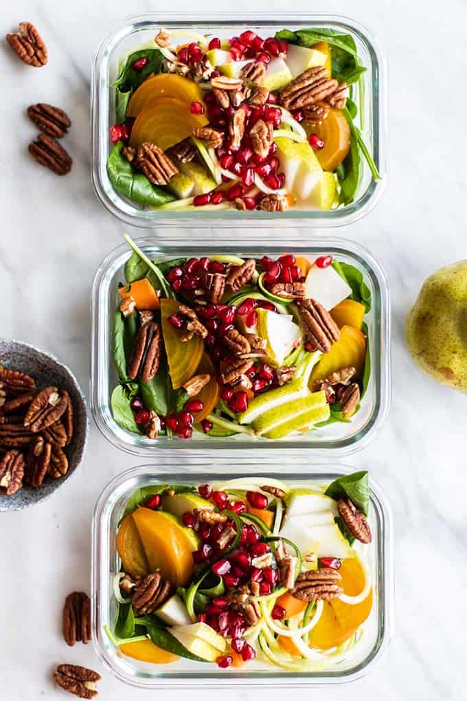 3 meal prep containers filled with zoodle salad.