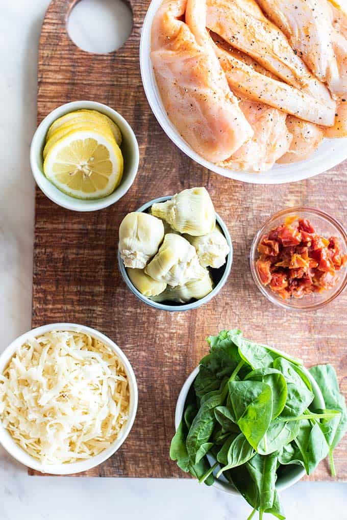 The ingredients for healthy baked stuffed chicken breasts.