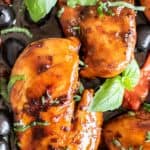 A close up of balsamic chicken breasts.