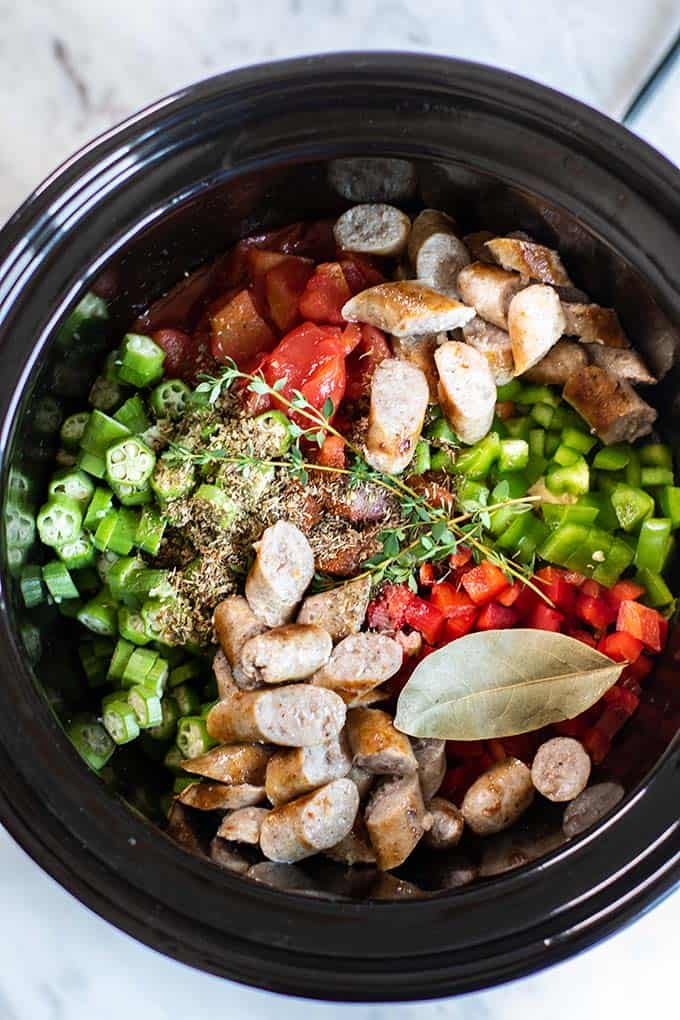 https://sunkissedkitchen.com/wp-content/uploads/2019/03/gumbo-ingredients-in-slow-cooker.jpg