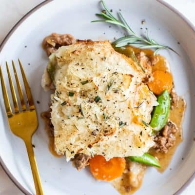 A slice of Whole30 Shepherds Pie shown on a plate.