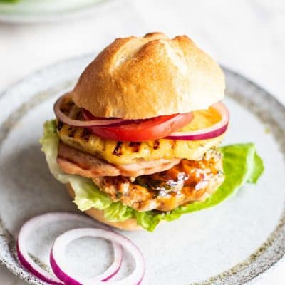 A Hawaiian Chicken burger on a gluten free bun.