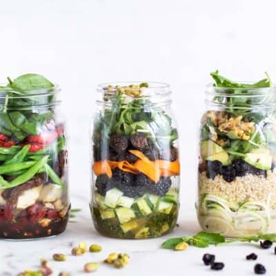 3 Mason jar salads showing how to pack the layers.