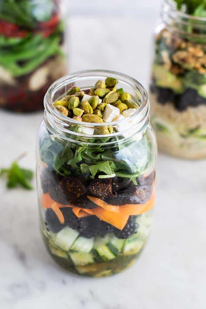 A blackberry and fig salad packed in a mason jar.