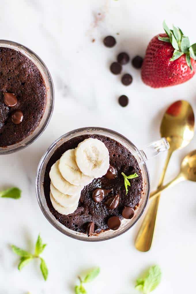 A close up showing the toppings on a baked chocolate mug cake.