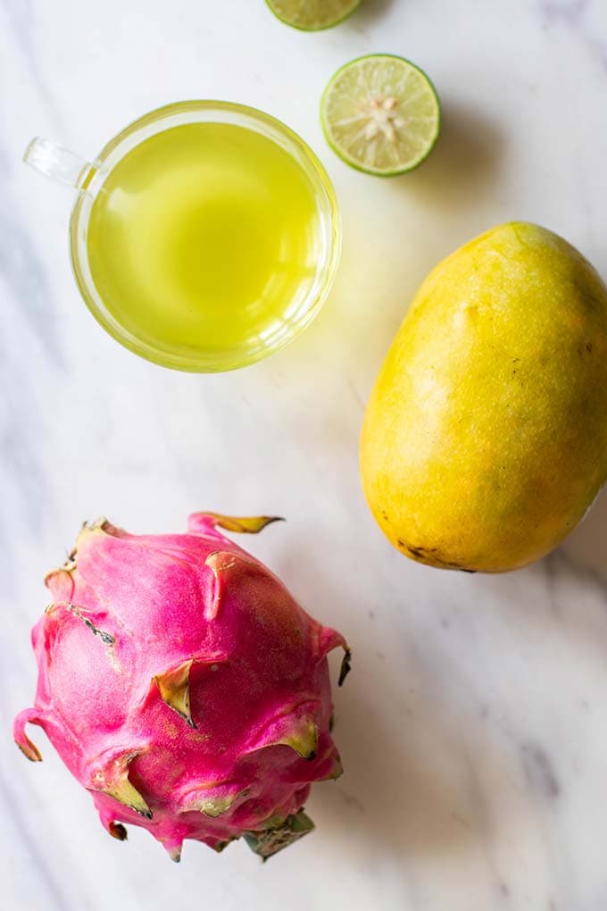 Dragon fruit, mango, lime and green tea, showing the ingredients for this recipe.