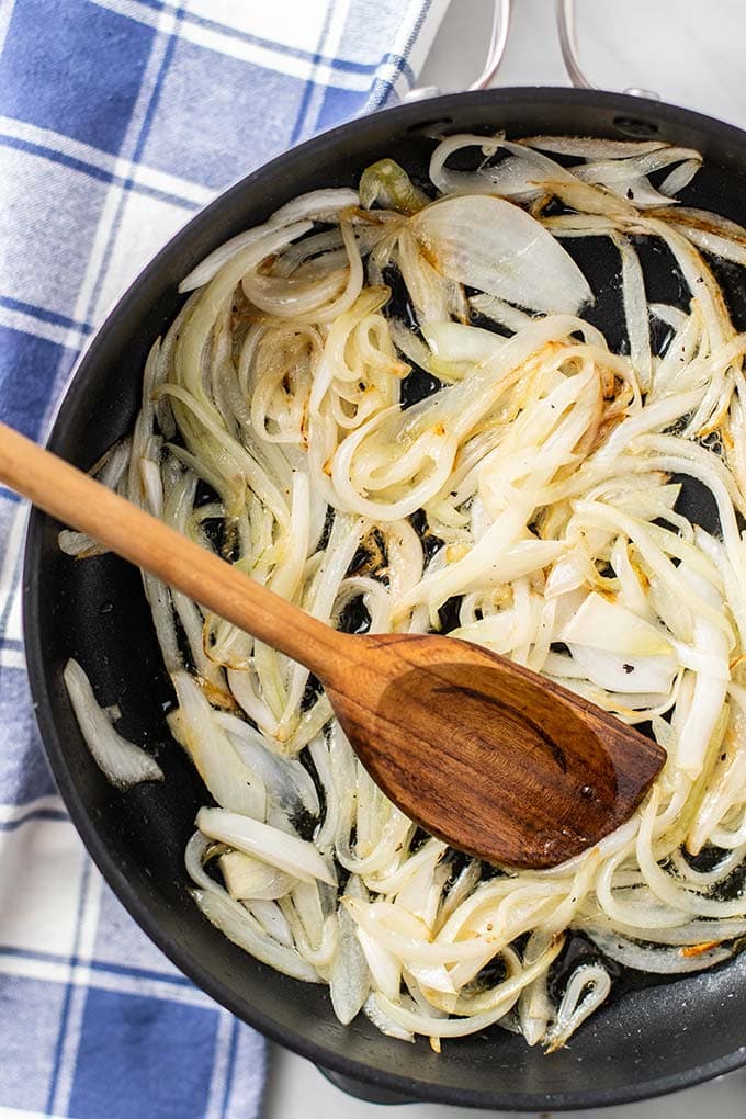 A frying pan with caramelized onions.