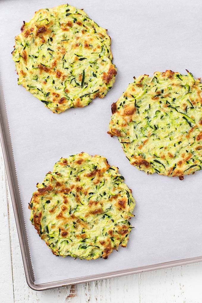 Zucchini pizza crusts baked and ready to be topped.