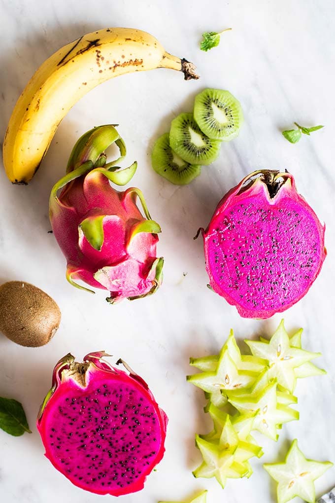 The fruit for this salad whole and ready to be prepared.