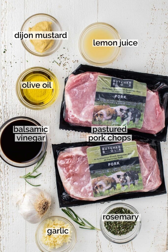 The ingredients for this pork chop marinade prepared in ramekins and labeled.