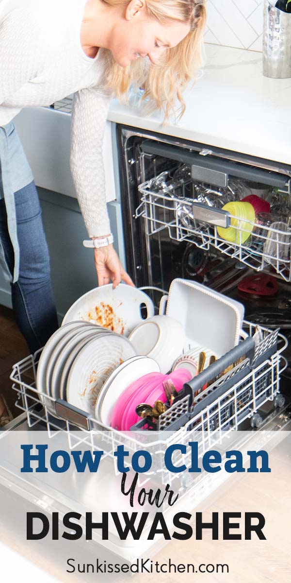 Michelle loading a dishwasher, showing putting dirty plates into the bottom rack.