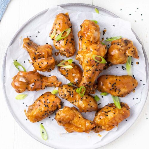 Air Fryer Chicken Wings with Spicy Asian Sauce - Sunkissed Kitchen