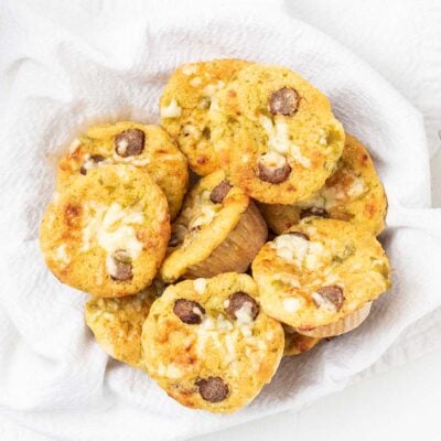 Cornbread muffins arranged in a basket.