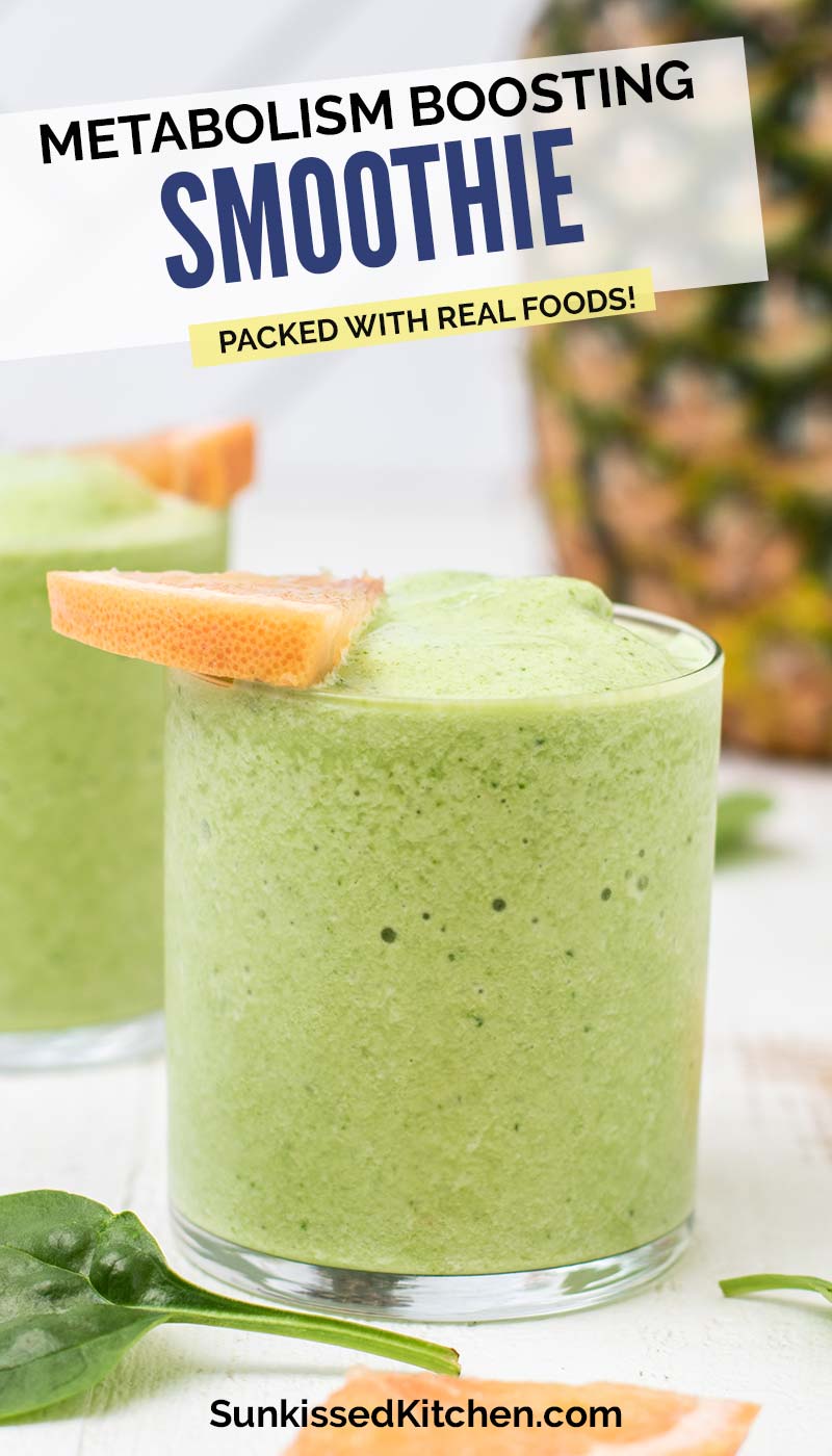 A vibrant green fat loss smoothie shown garnished with a grapefruit wedge.