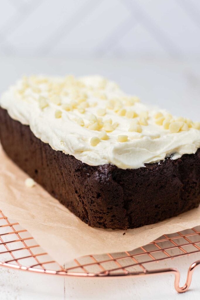A cooled gingerbread cake topped with a thick layer of white chocolate mascarpone.