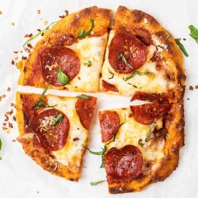 A sweet potato pizza crust baked with cheese and pepperoni.