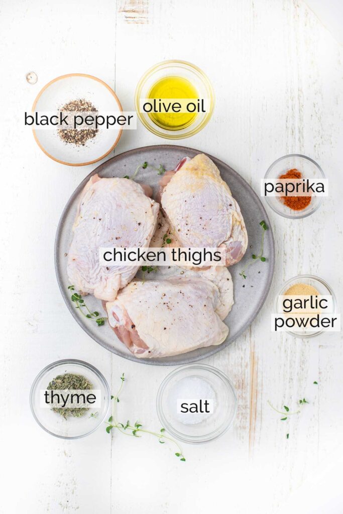 The ingredients needed to make crispy air fryer chicken thighs.