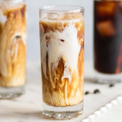 3 glasses of cold brew coffee poured over ice.