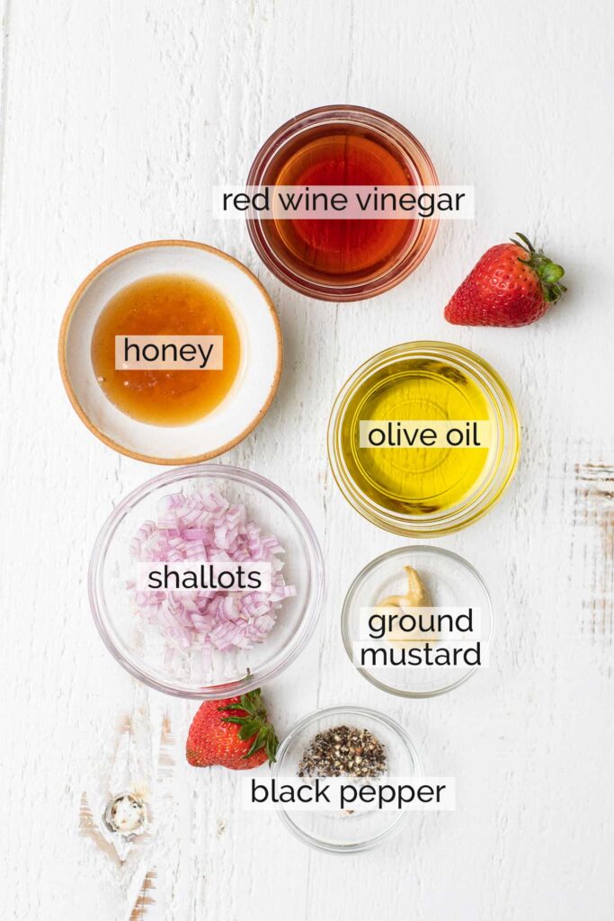 The ingredients needed to make a simple dijon vinaigrette.