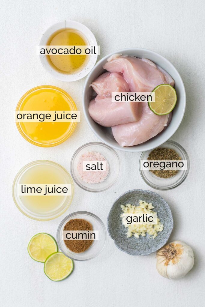 The ingredients needed to make chicken carnitas from chicken breasts.