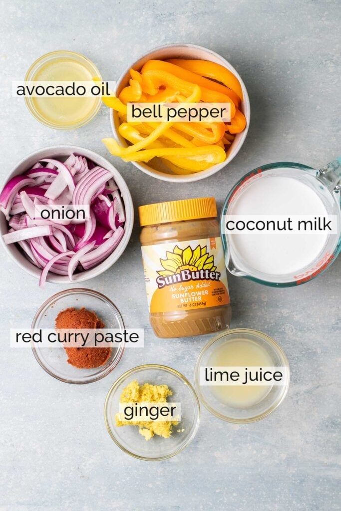 The ingredients needed to make a creamy coconut milk red curry sauce.