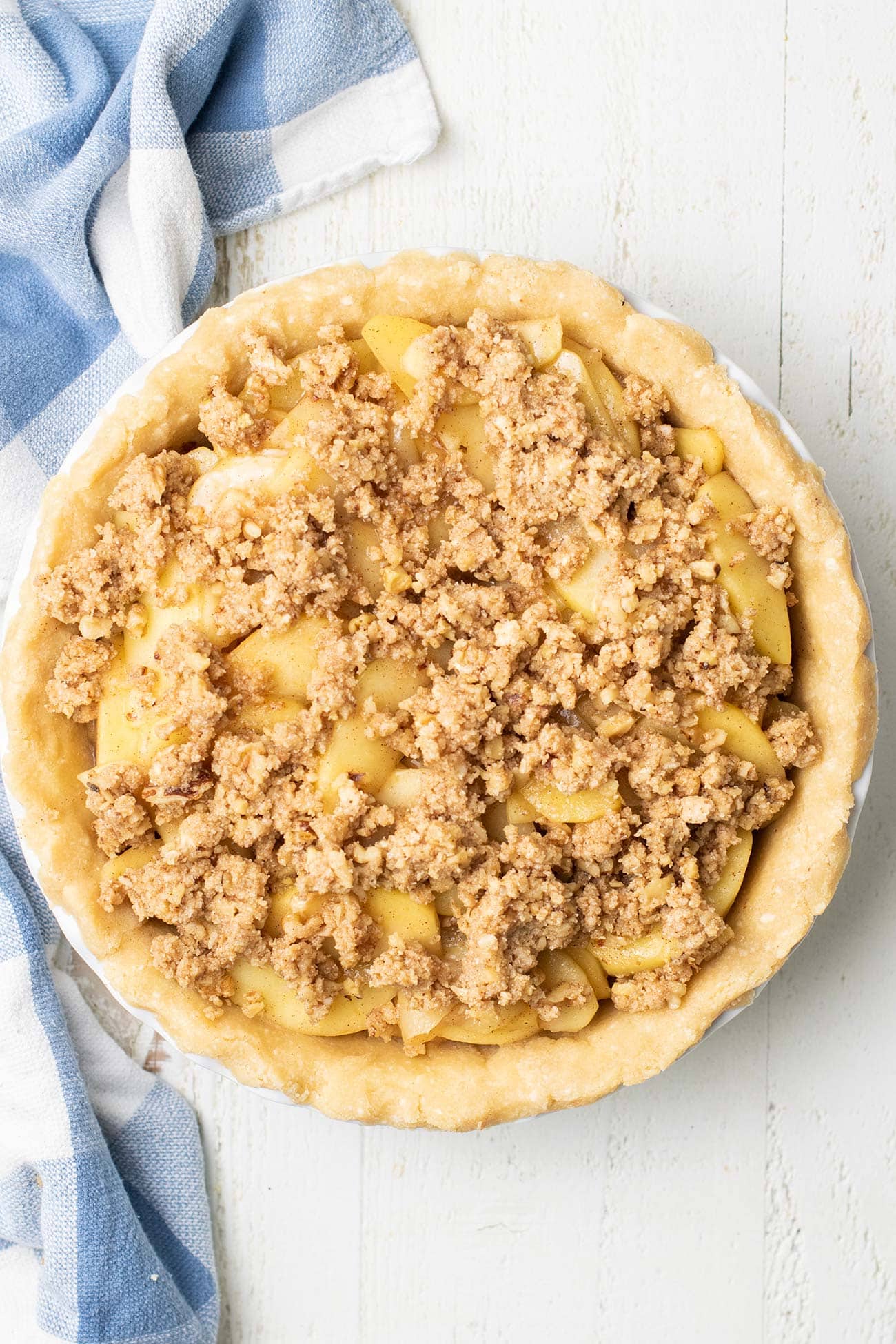 An apple pie topped with a crumble topping.