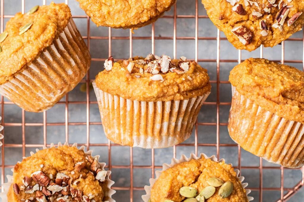 Sweet potato muffins on a cooling rack.