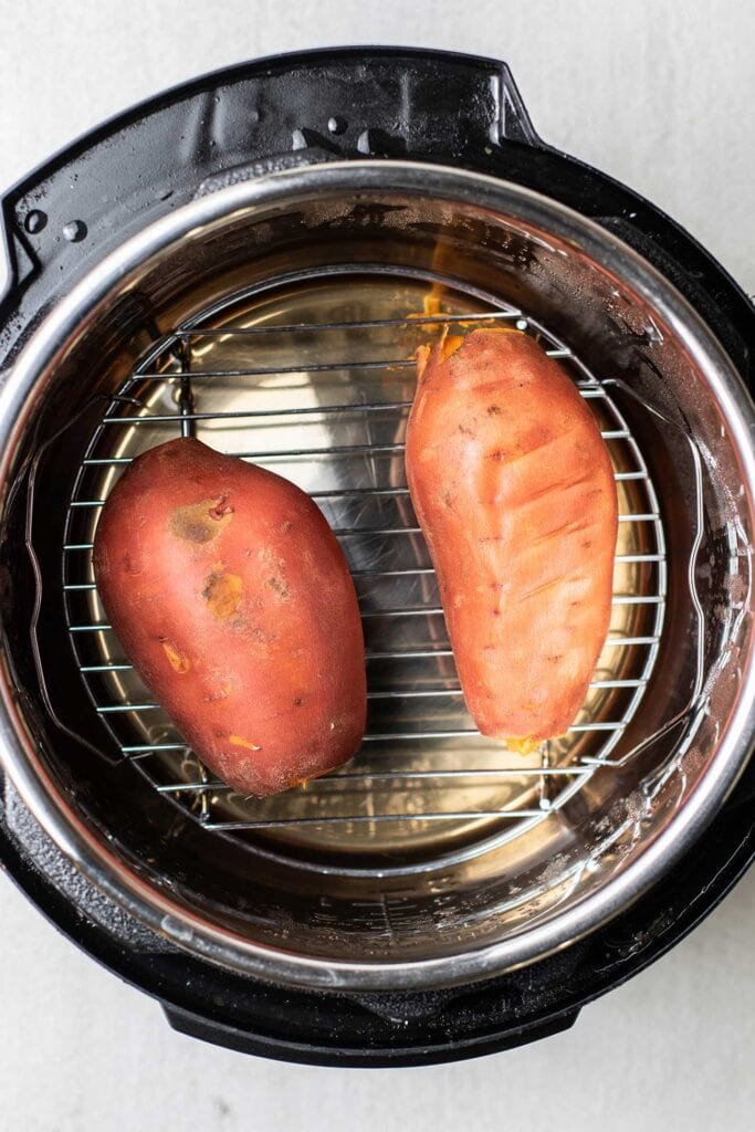 Two medium sized sweet potatoes cooked in an instant pot.
