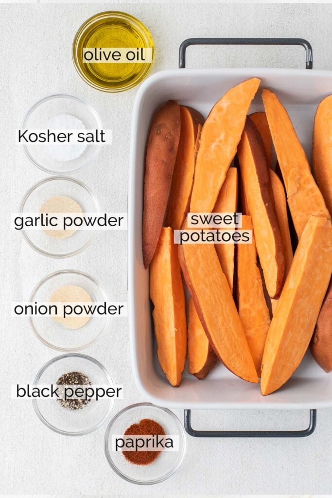 The ingredients needed to make savory spiced roasted sweet potatoes.