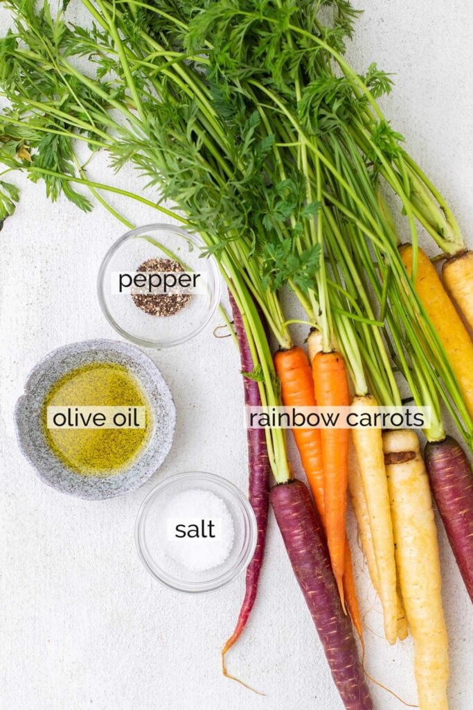 The ingredients needed to roast rainbow carrots.