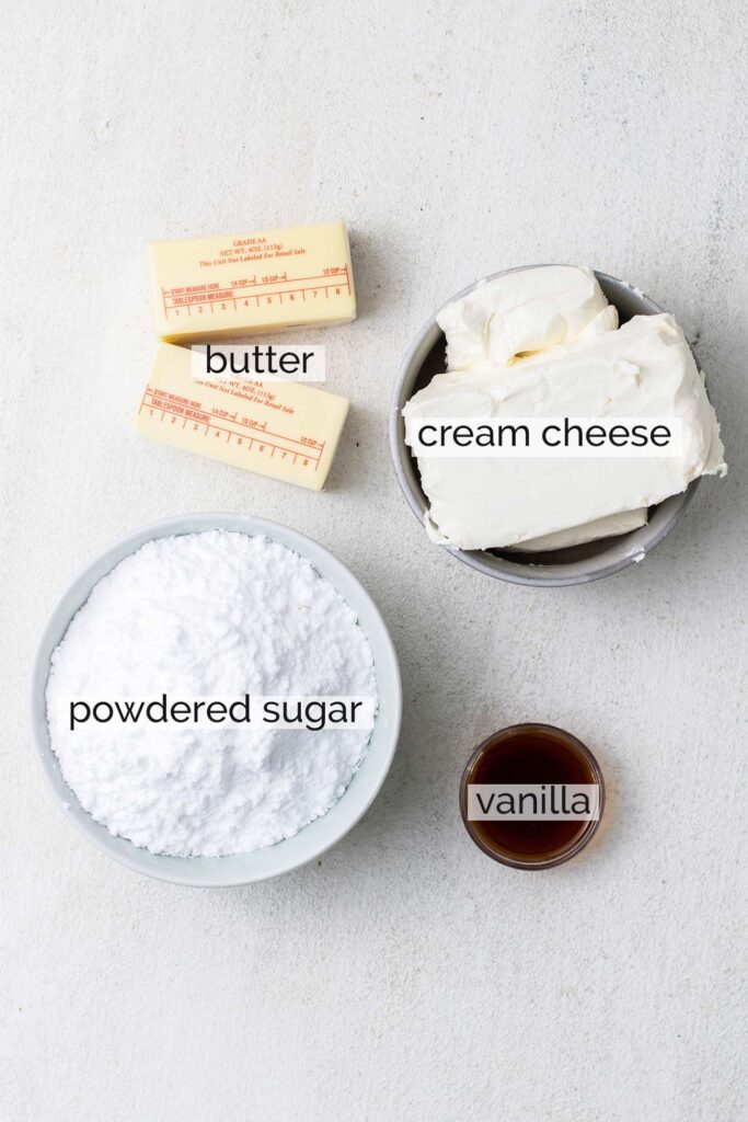 The 4 ingredients needed to make cream cheese frosting.
